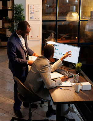 Two professionals reviewing business analytics